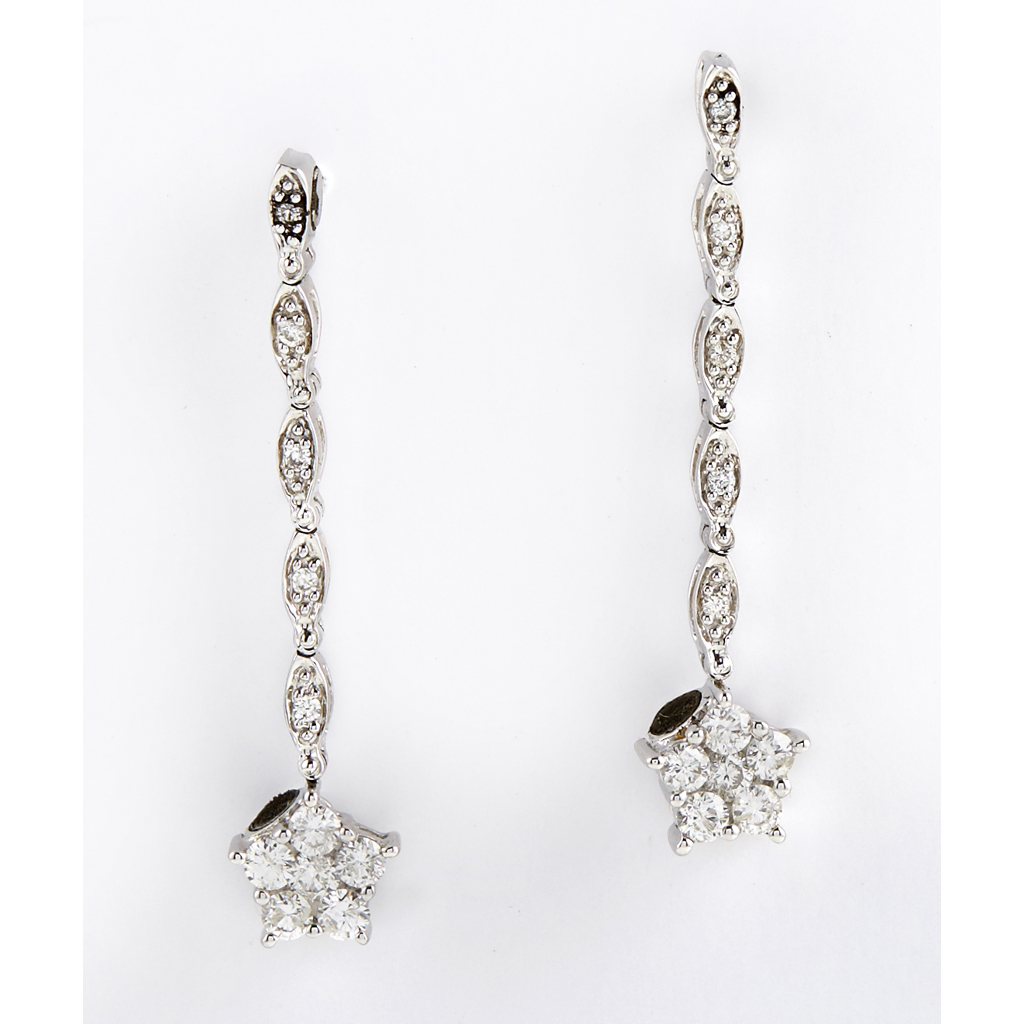 A pair of diamond set cluster/pendant earrings