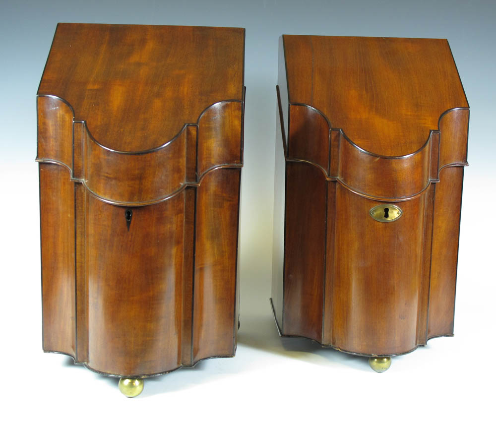 A pair of George III mahogany and ebony strung knife boxes