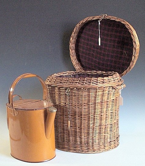 A pair of painted metal water cans