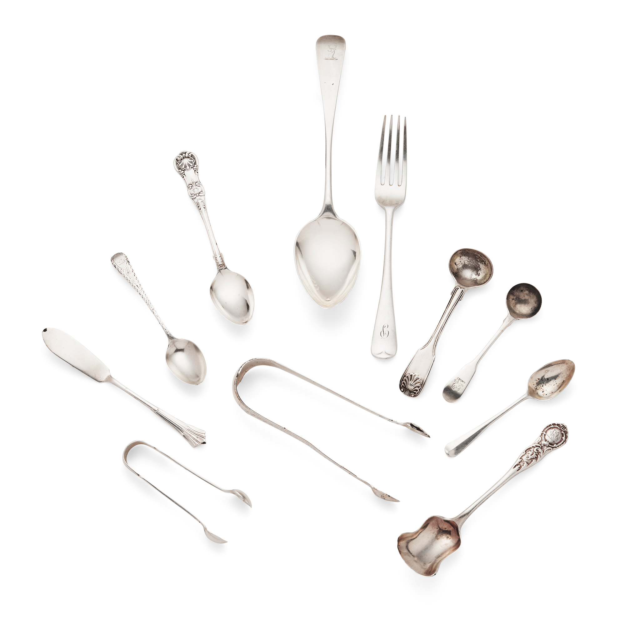 A MATCHED SET OF NINE TABLESPOONS