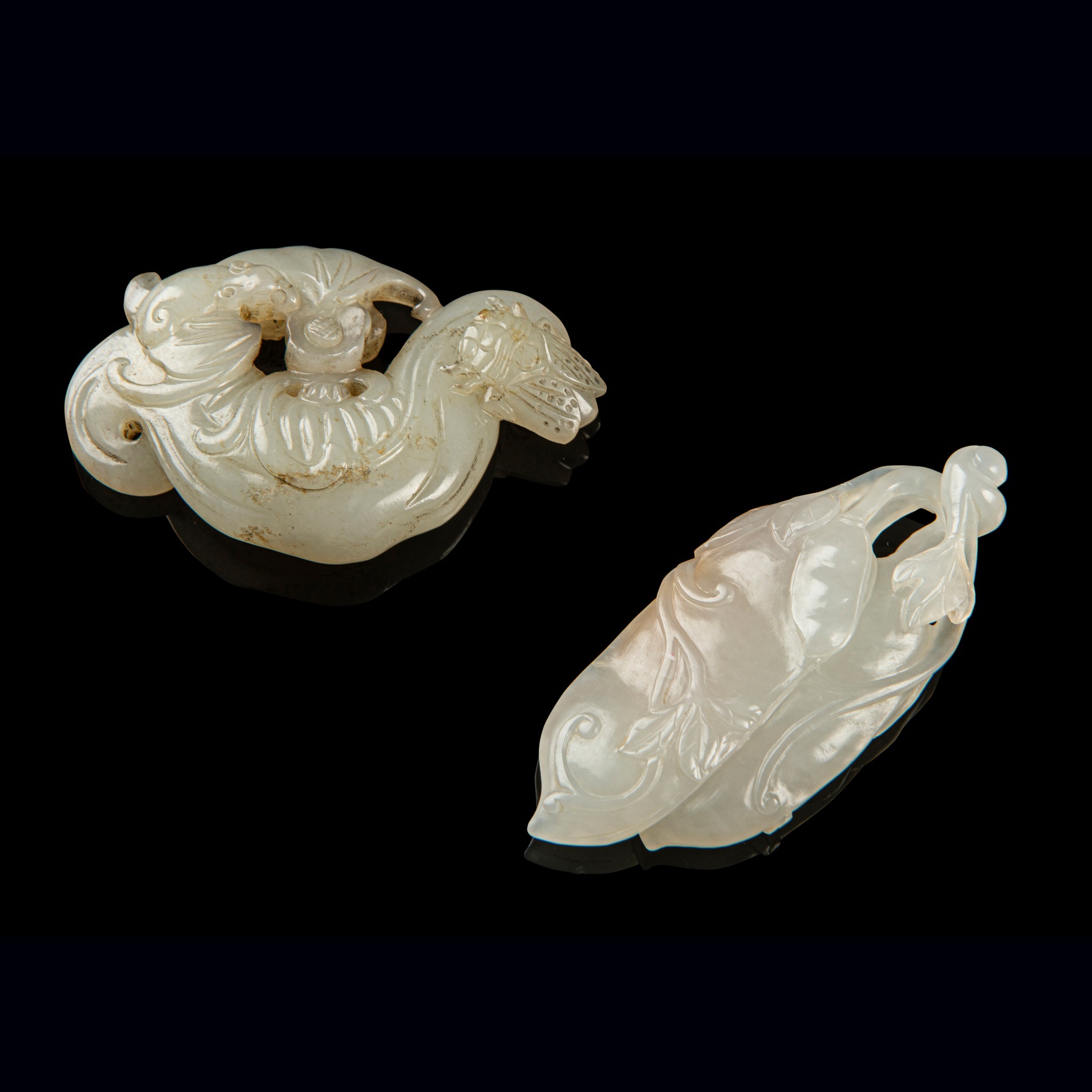 TWO JADE PENDANTS