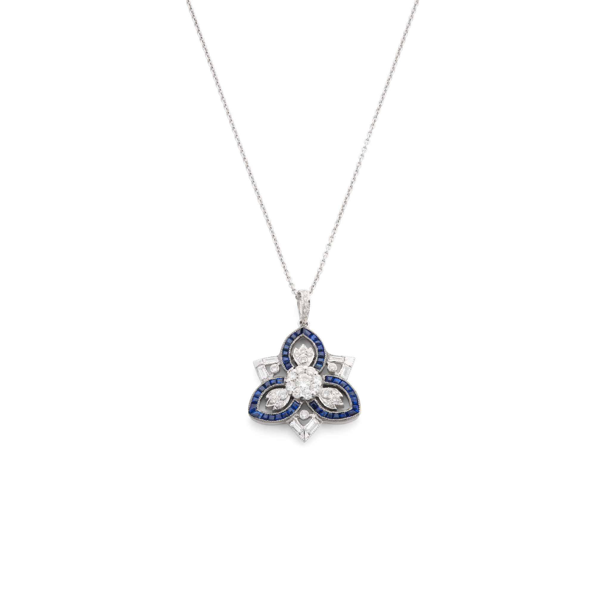 A sapphire and diamond pendant necklace