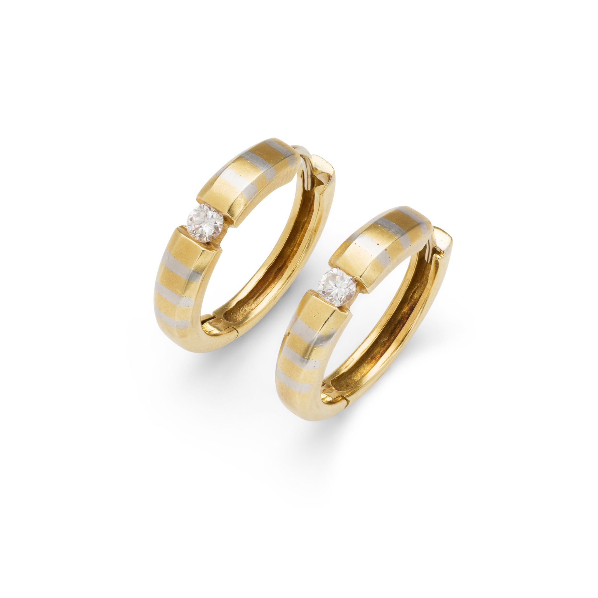 A pair of diamond hoop earrings