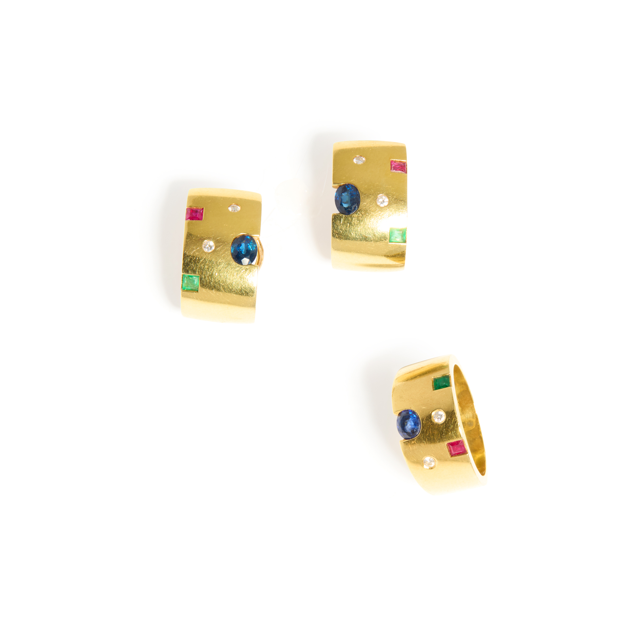 A multi-gem ring and matching earrings