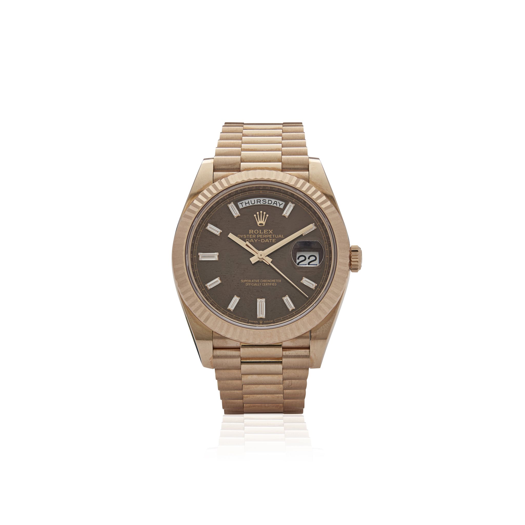 Rolex. A rare and very attractive 18k rose gold automatic day-date wristwatch with diamond-set dial