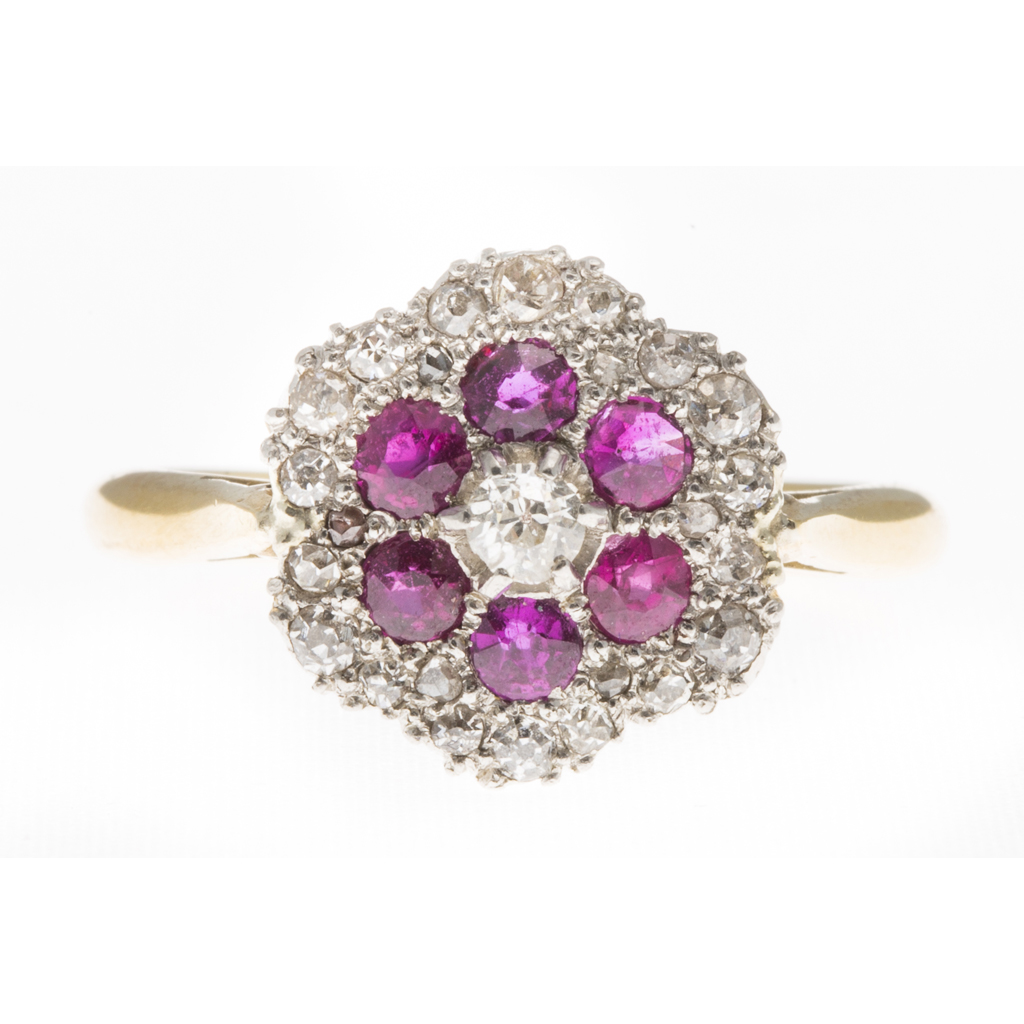 A ruby and diamond set cluster ring