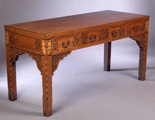 An Arts and Crafts oak desk