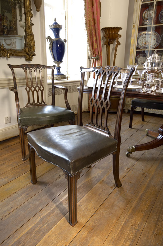 A set of sixteen mahogany dining chairs