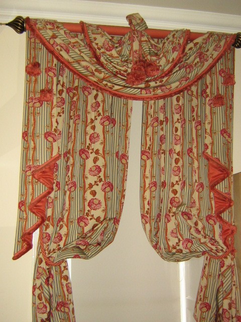A pair of rose pattern curtains