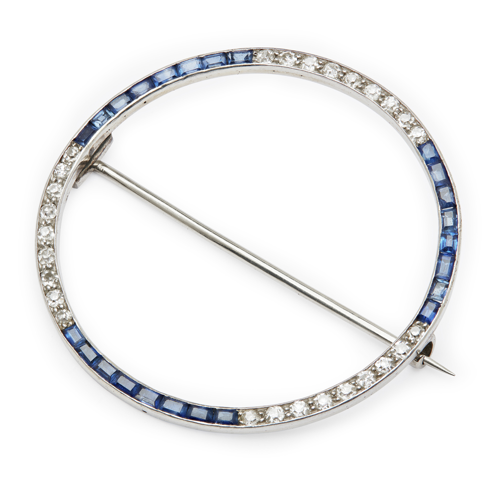 A diamond and sapphire set brooch