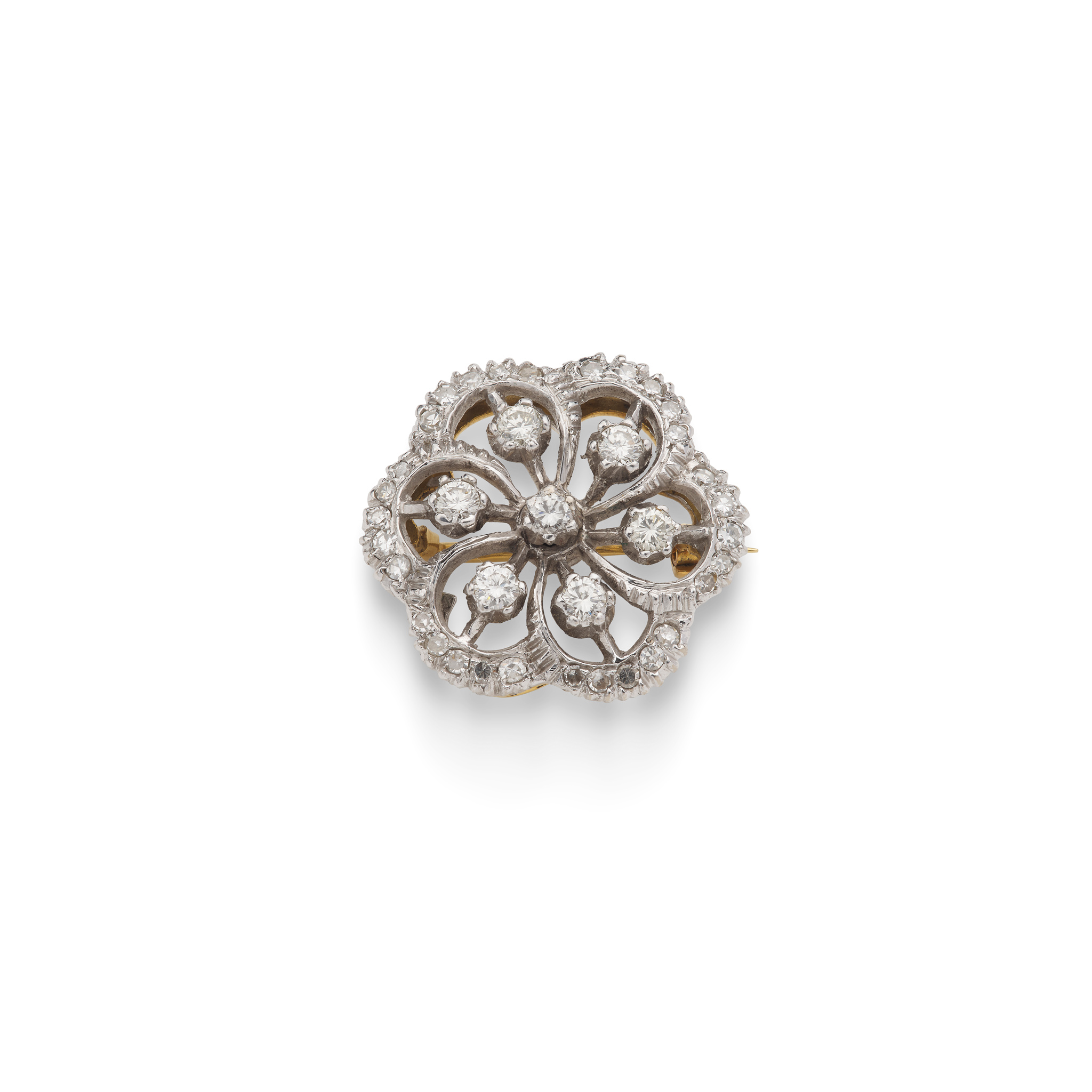 A diamond pinwheel brooch