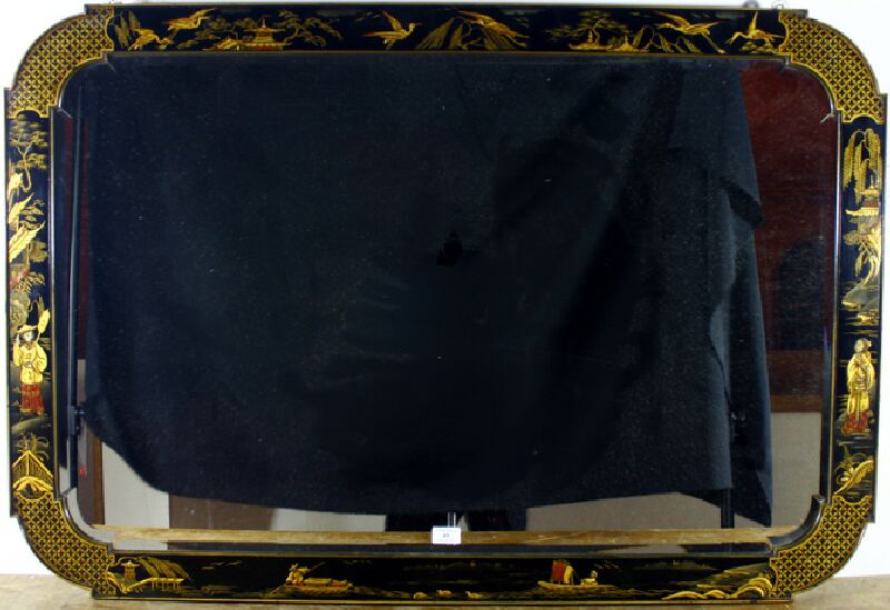 A 19th century black laquered chinoiserie mirror