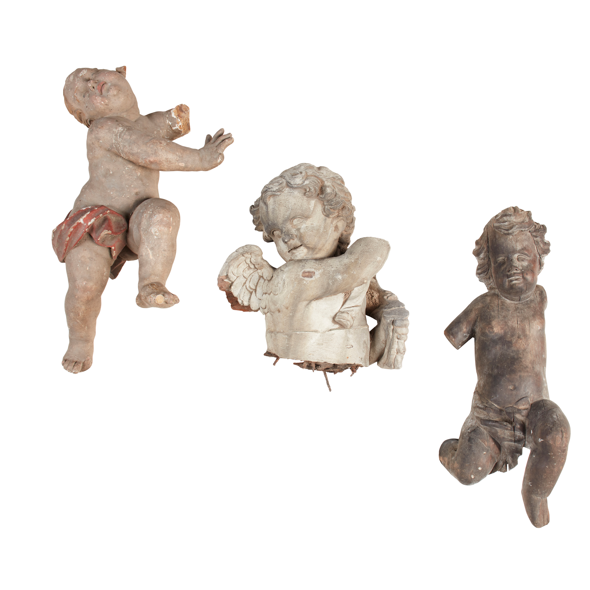 GROUP OF CARVED PUTTI