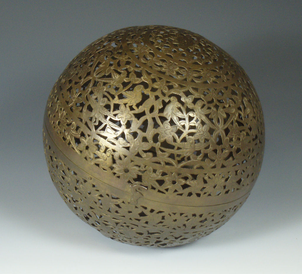 A large Eastern brass incense ball