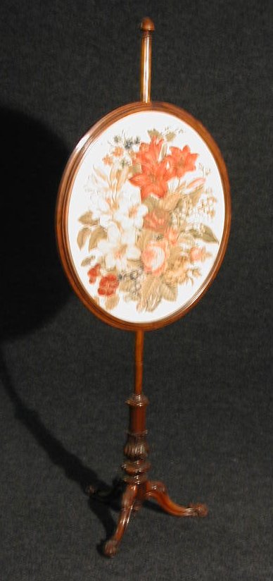 A mahogany polescreen,