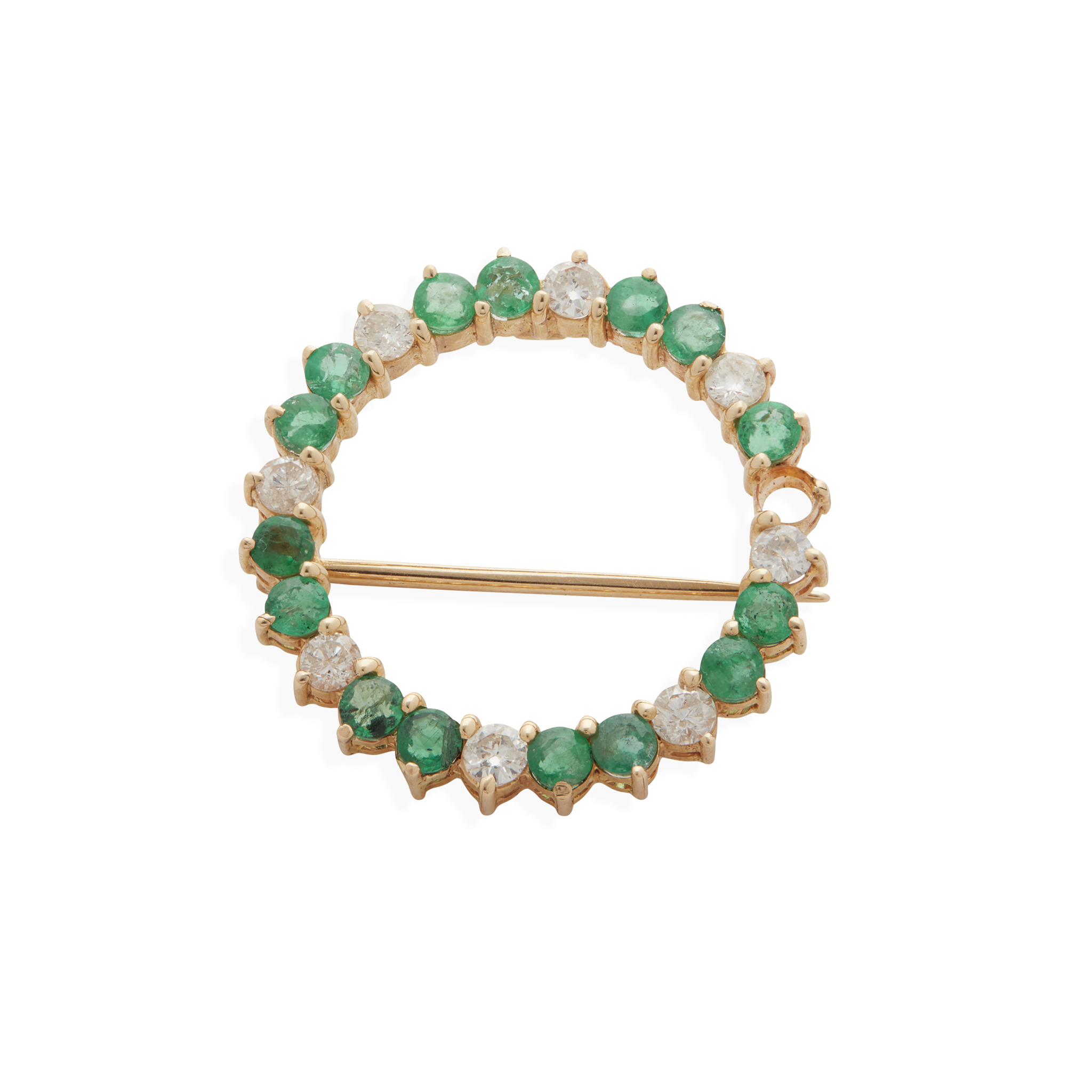 An emerald and diamond brooch