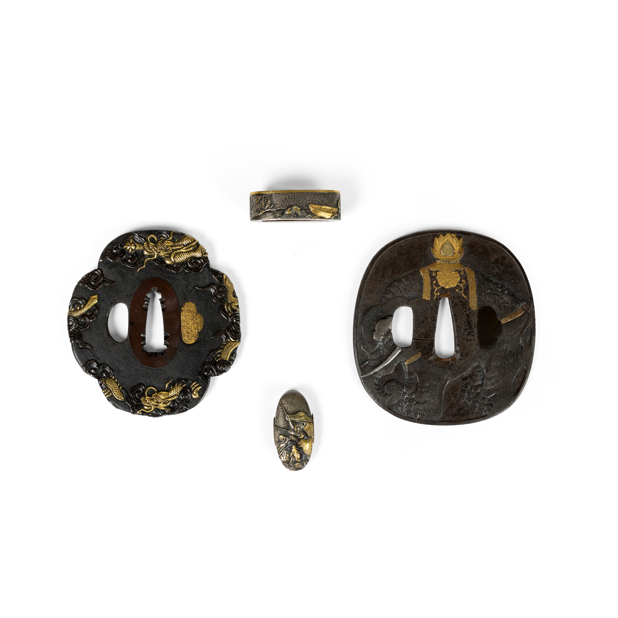 GROUP OF FOUR JAPANESE MIXED METAL EDGED-WEAPON ACCESSORIES
