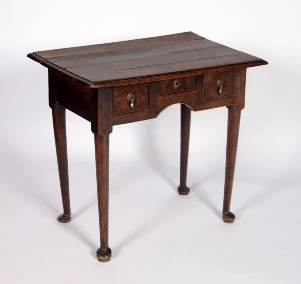 A George III walnut lowboy