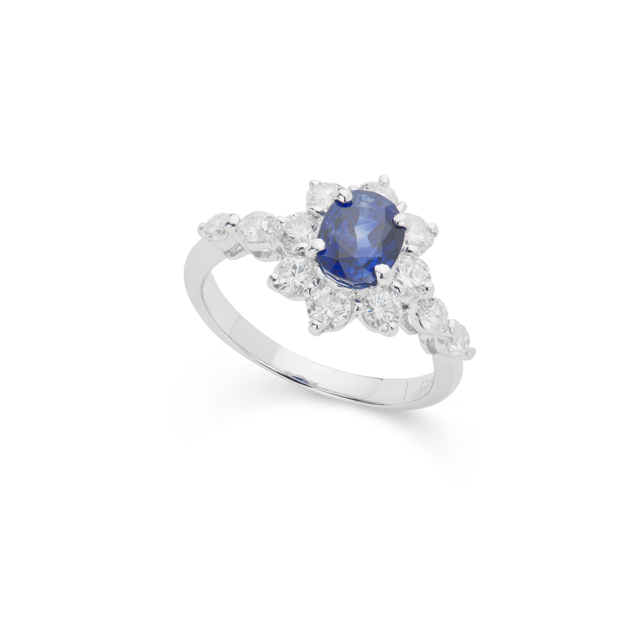 An unheated sapphire and diamond ring