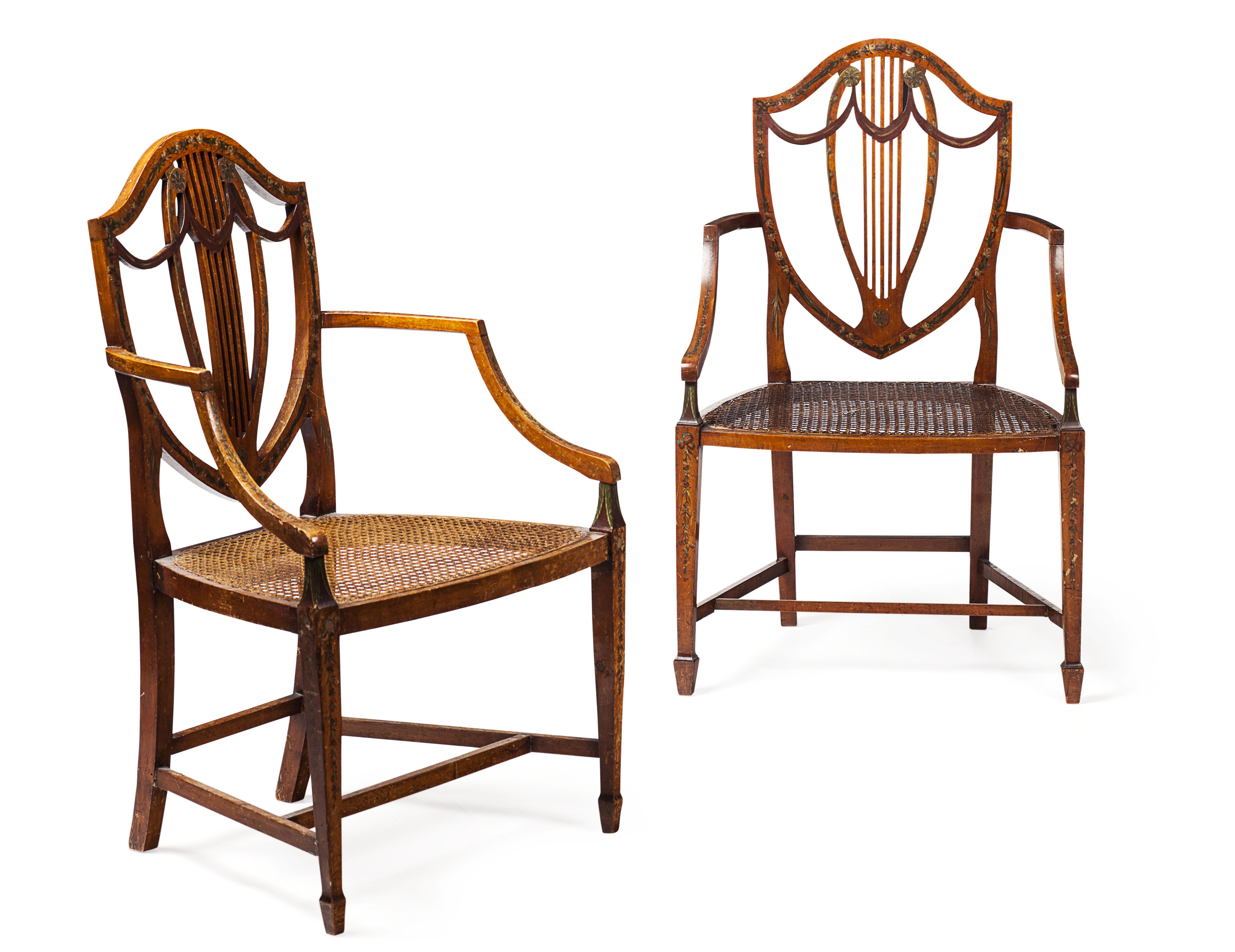 MATCHED PAIR OF GEORGE III STYLE PAINTED SATINWOOD AND CANED OPEN ARMCHAIRS