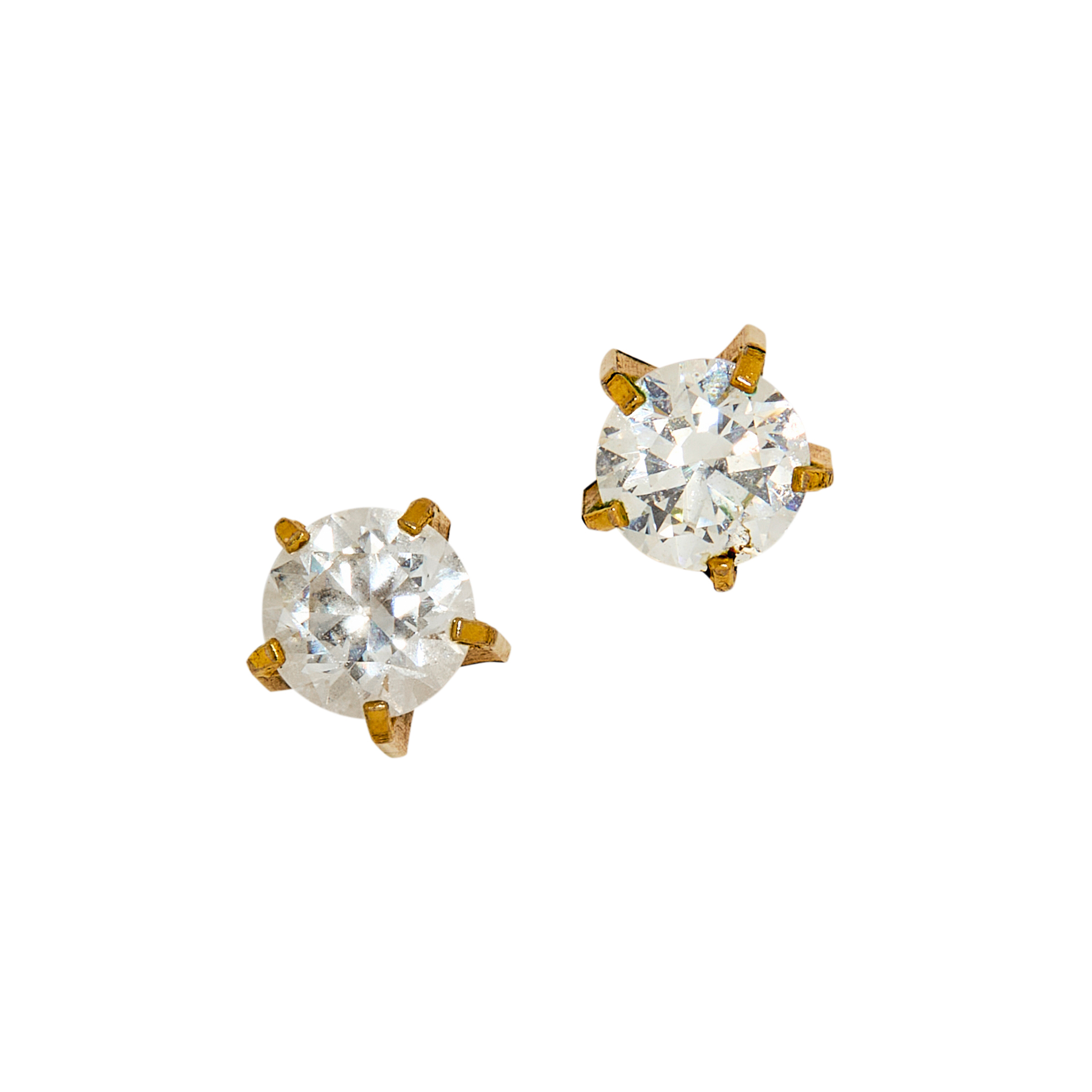 A pair of diamond stud earrings