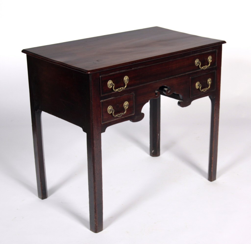 A Georgian mahogany lowboy