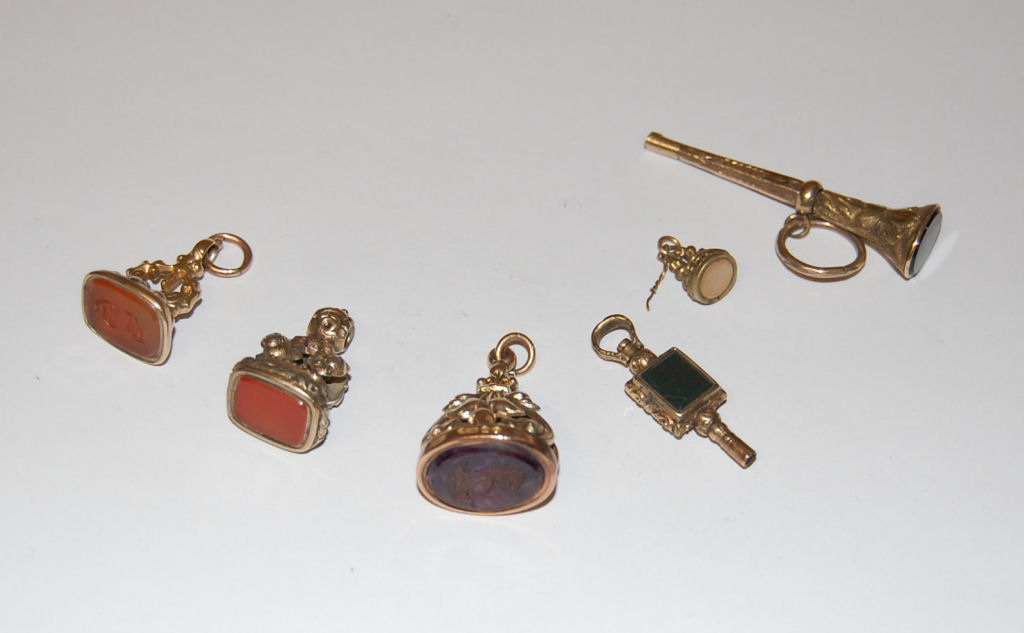 A 9ct gold amethyst set watch fob