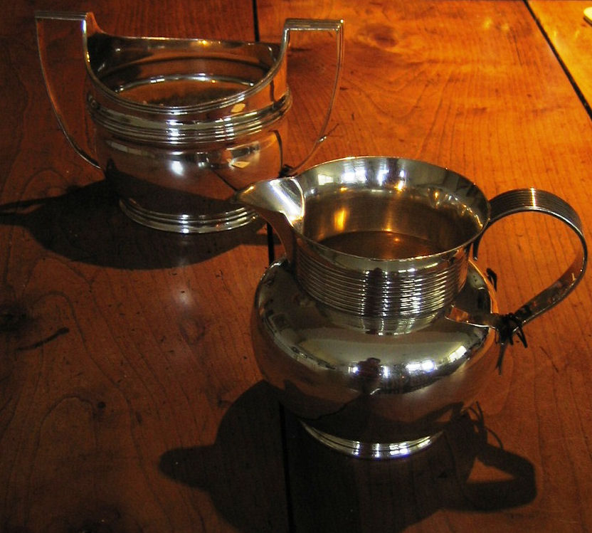 A Georgian style silver milk jug