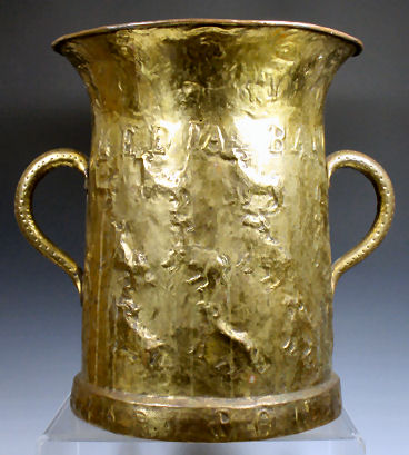 A brass stick holder Provenance: Kildrummy Castle, Aberdeenshire