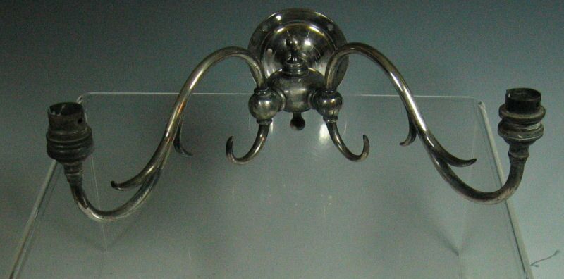 A set of four plated sconces