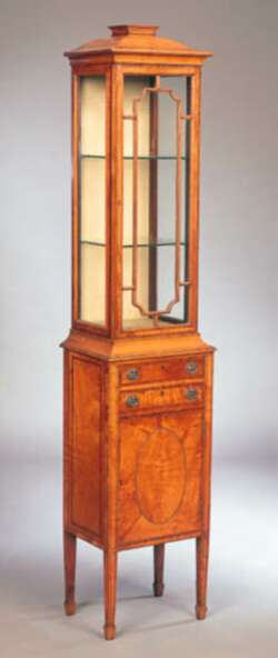 An Edwardian satinwood display cabinet