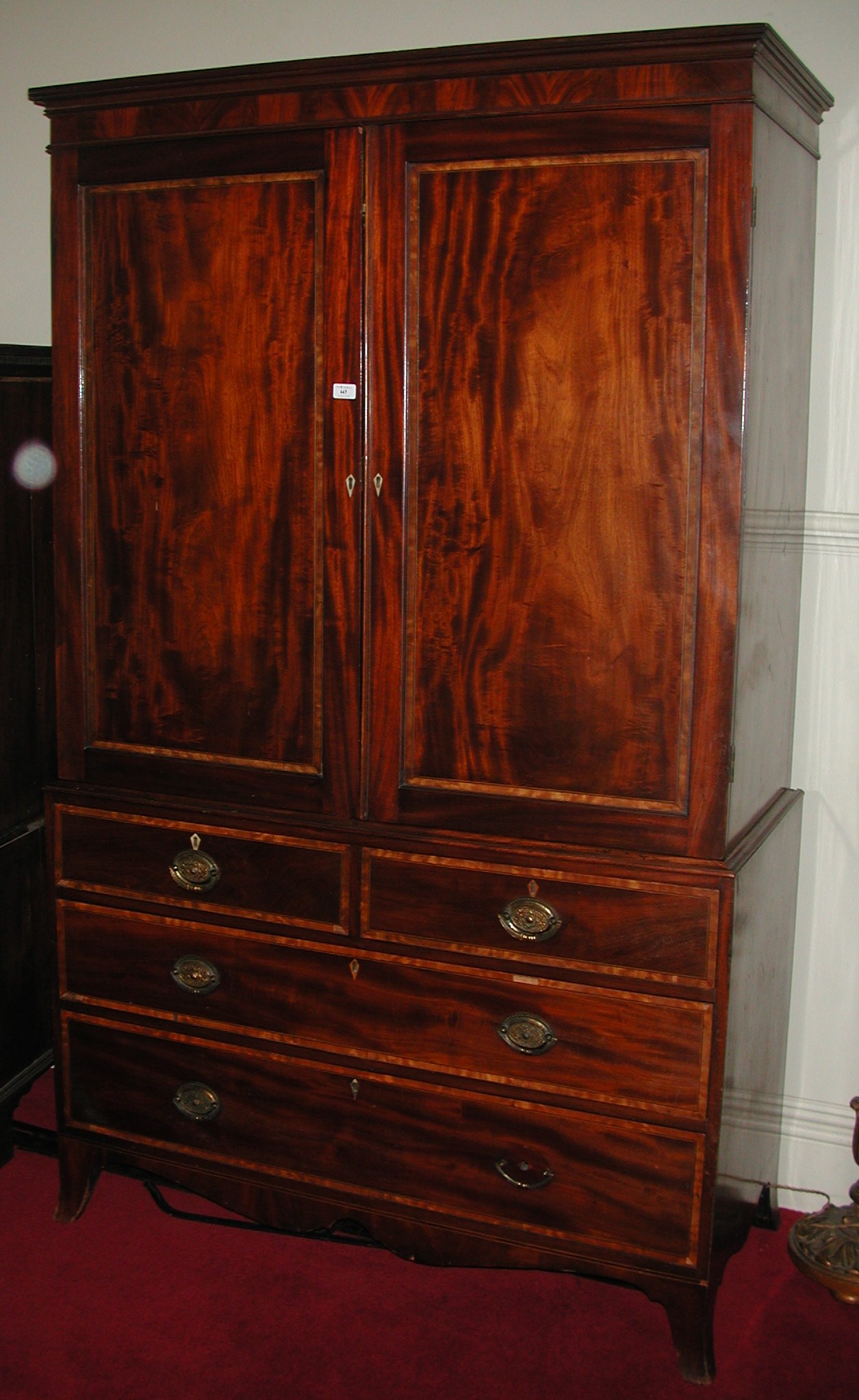 A George III mahogany linen press,