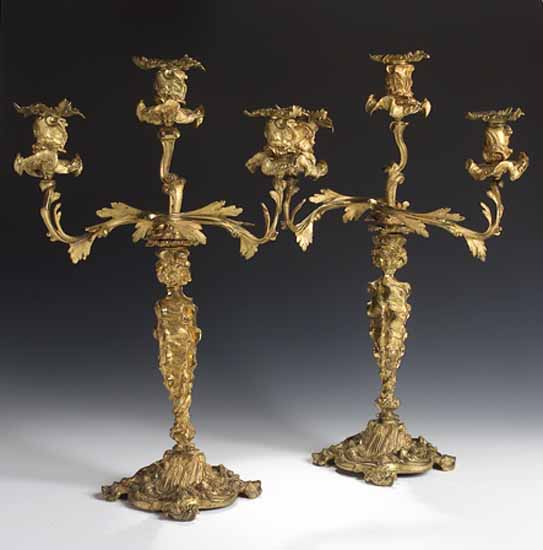 A pair of 19th century gilt brass table candlebra