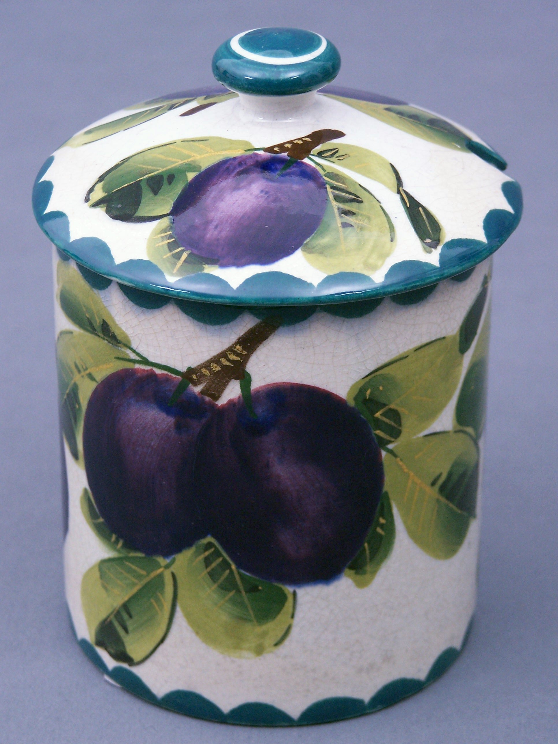 A Wemyss preserve jar and cover,