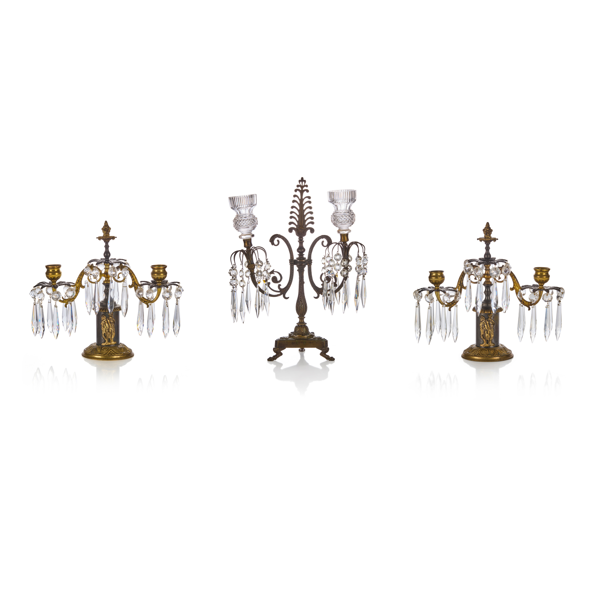 THREE REGENCY BRASS AND CUT GLASS CANDELABRA