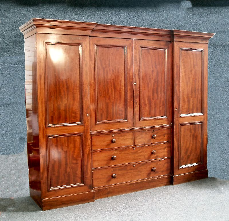 A Victorian mahogany triple breakfront wardrobe,