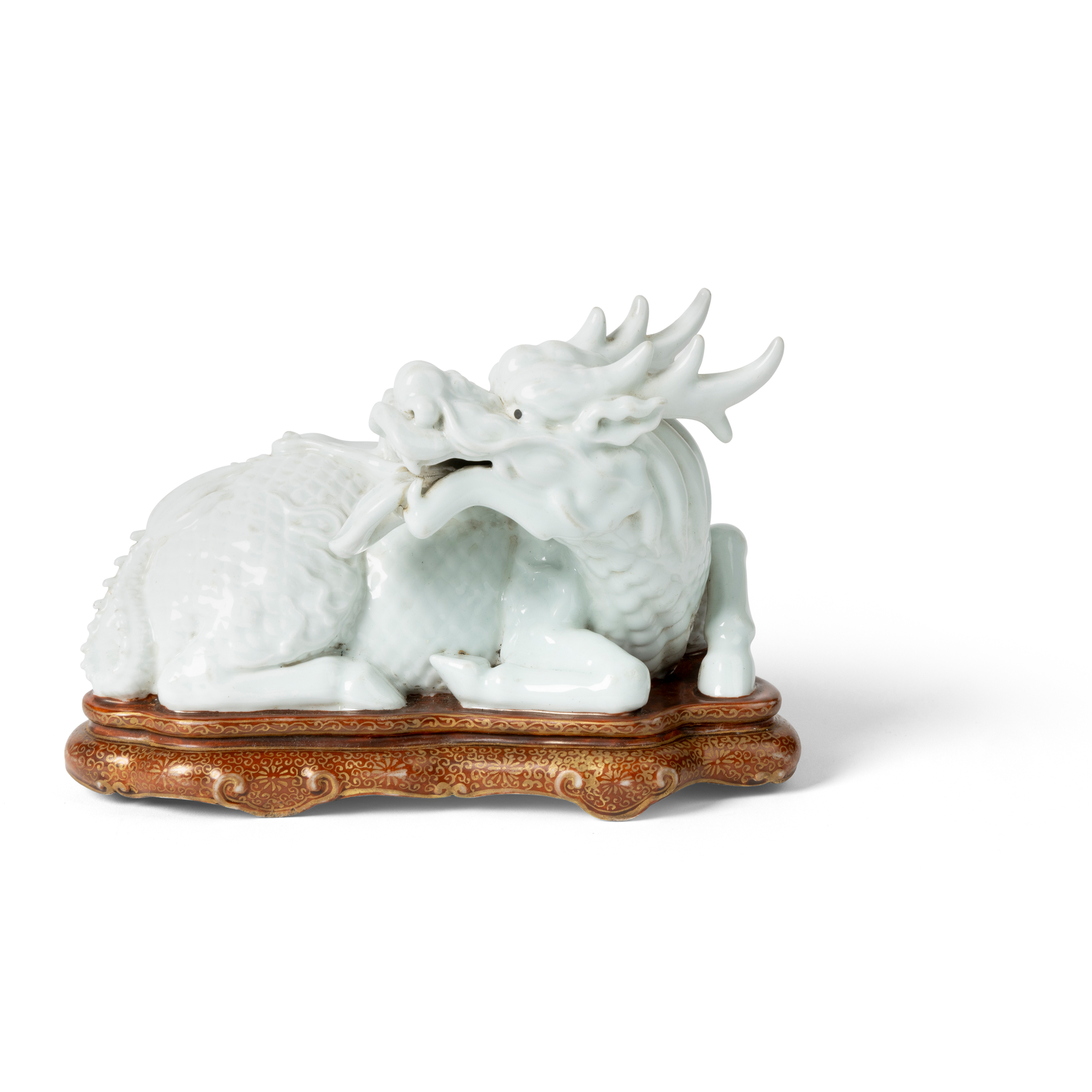 CHINESE WHITE-GLAZED MODEL OF A QILIN
