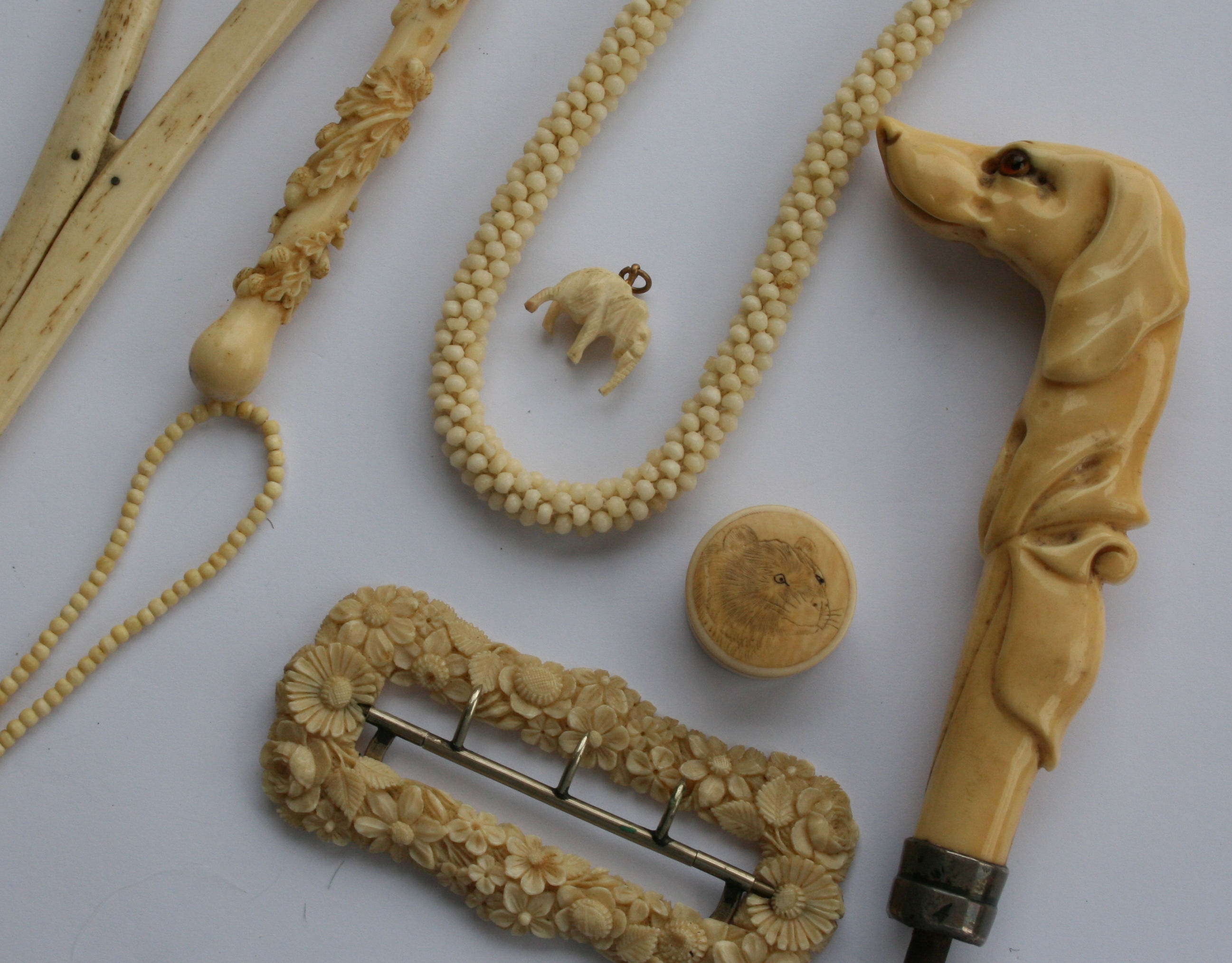 An ivory cane handle