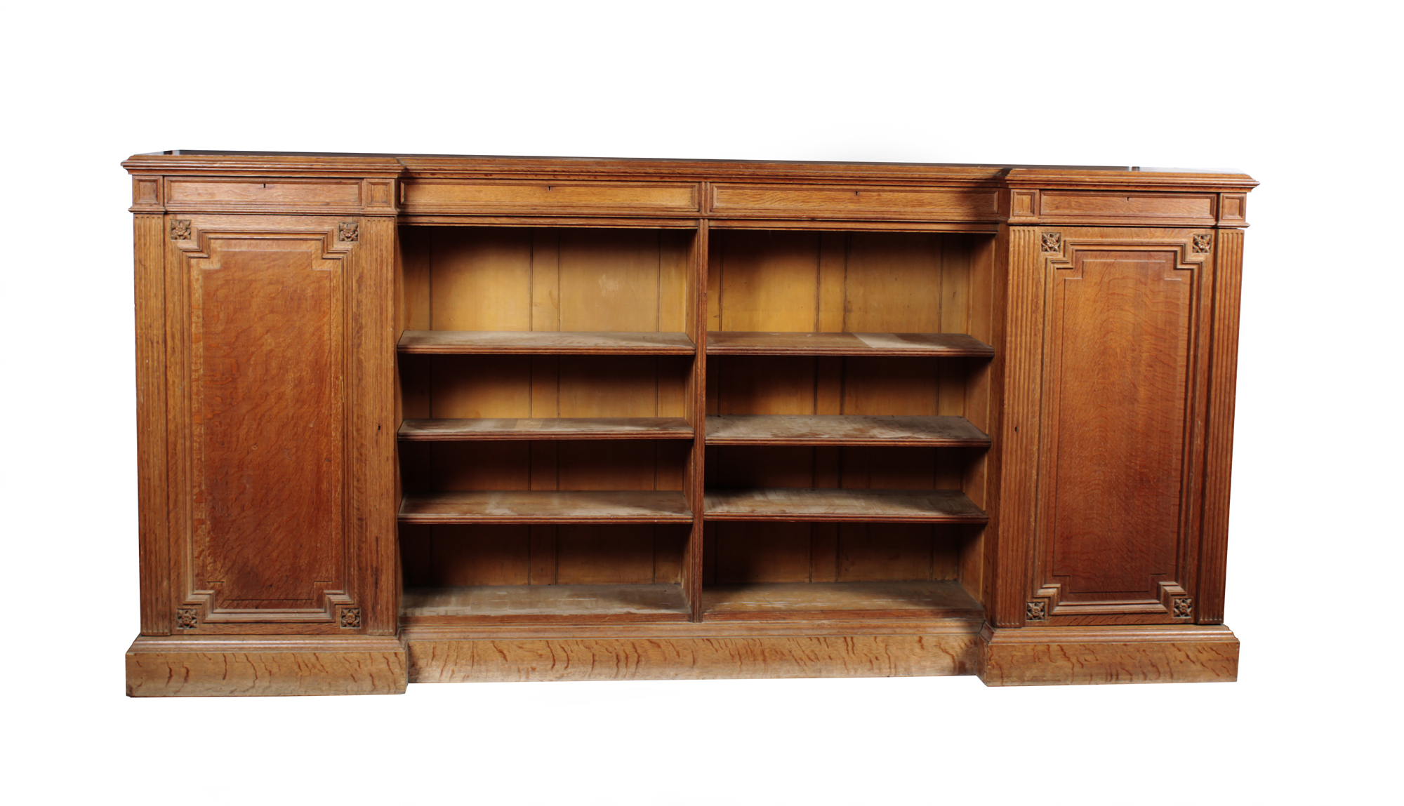 OAK INVERTED BREAKFRONT LOW BOOKCASE