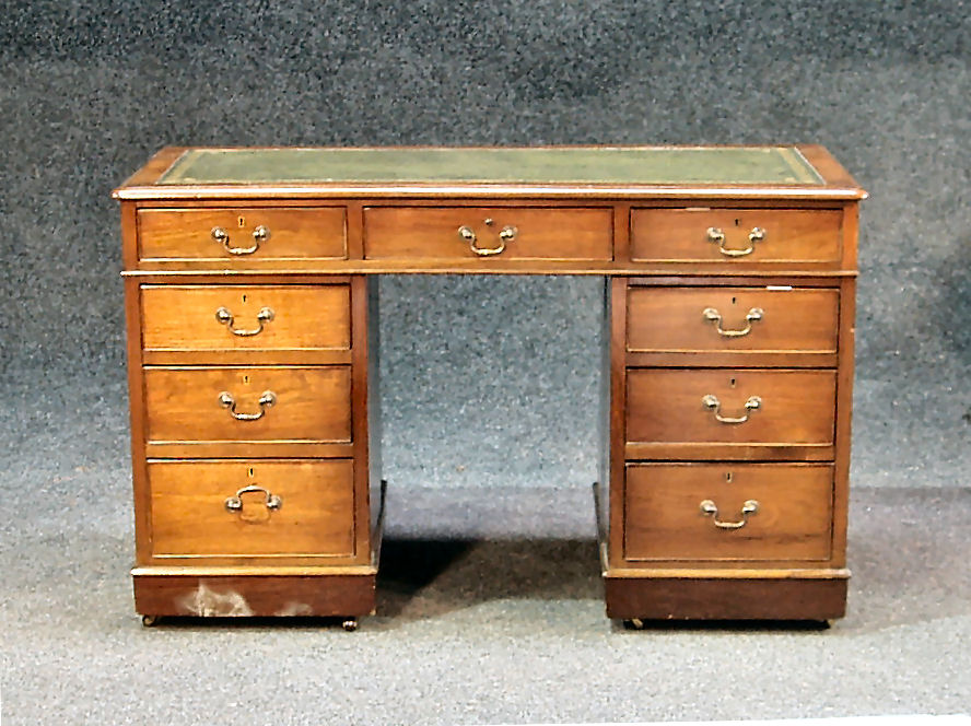 A Victorian mahogany pedestal desk