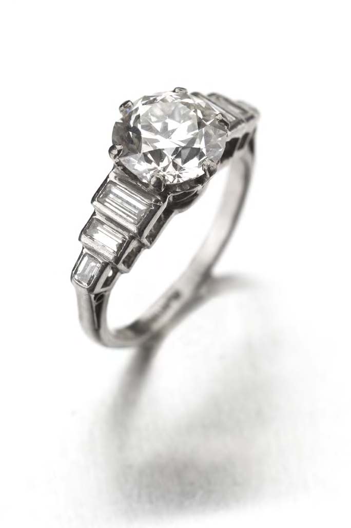 An Art Deco platinum mounted diamond ring,