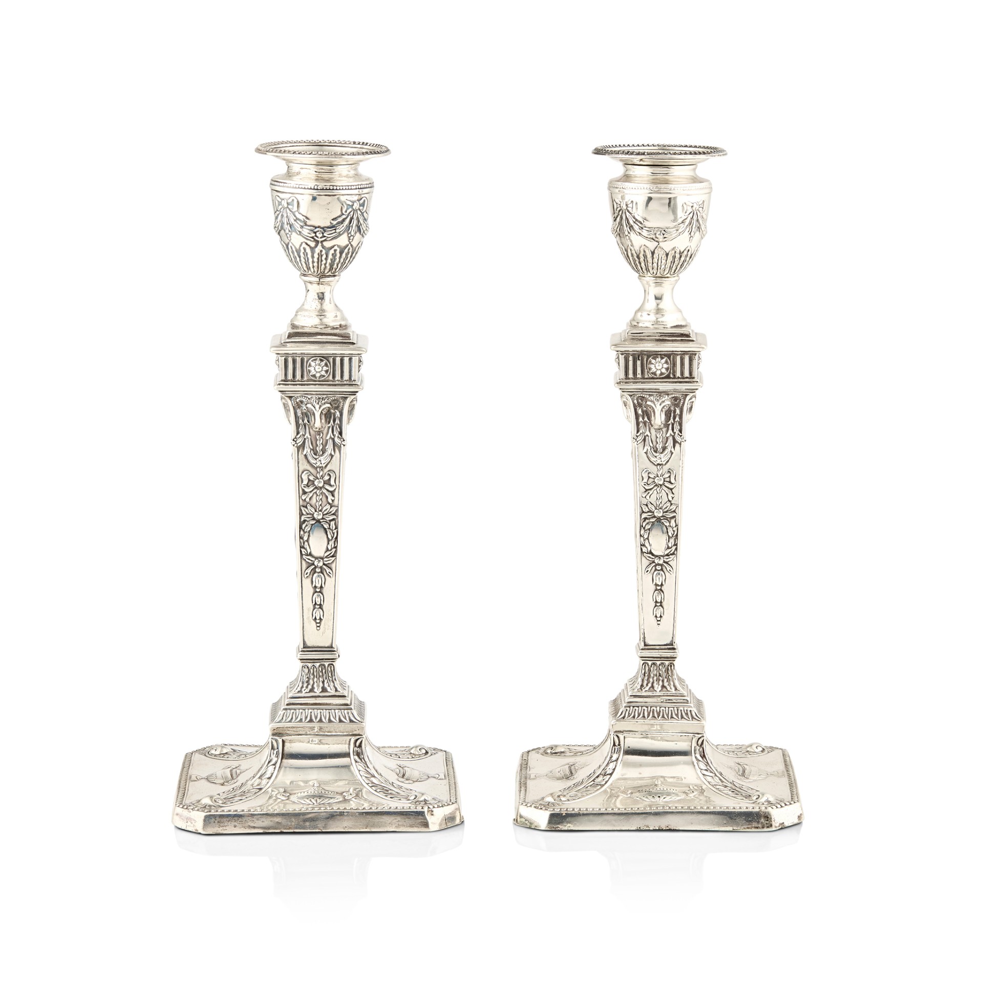 A PAIR OF LATE VICTORIAN CANDLESTICKS
