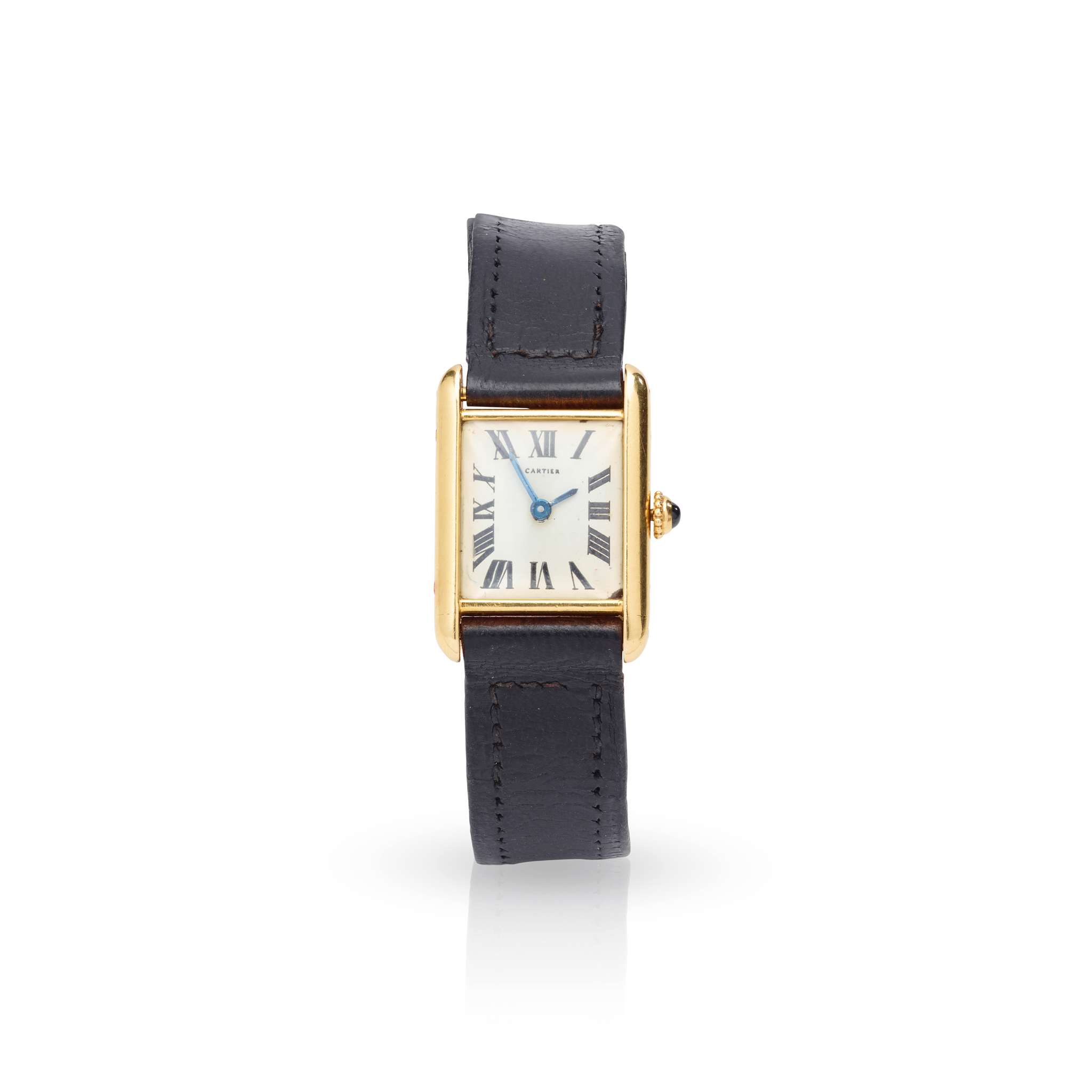 Cartier: A gold rectangular wristwatch