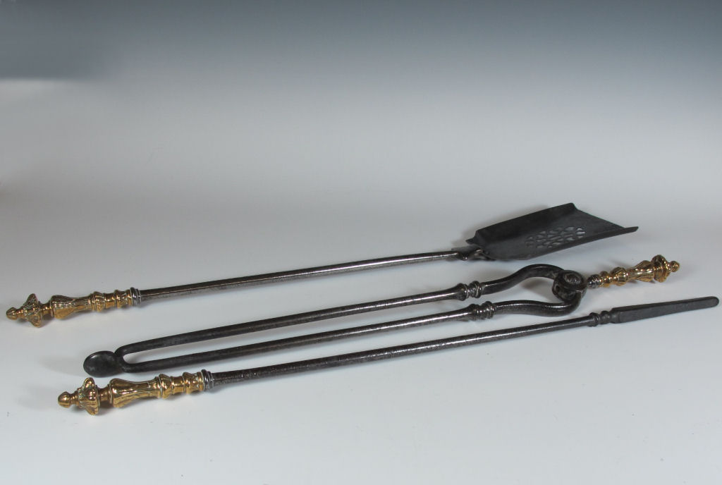 Three Georgian brass mounted fire irons