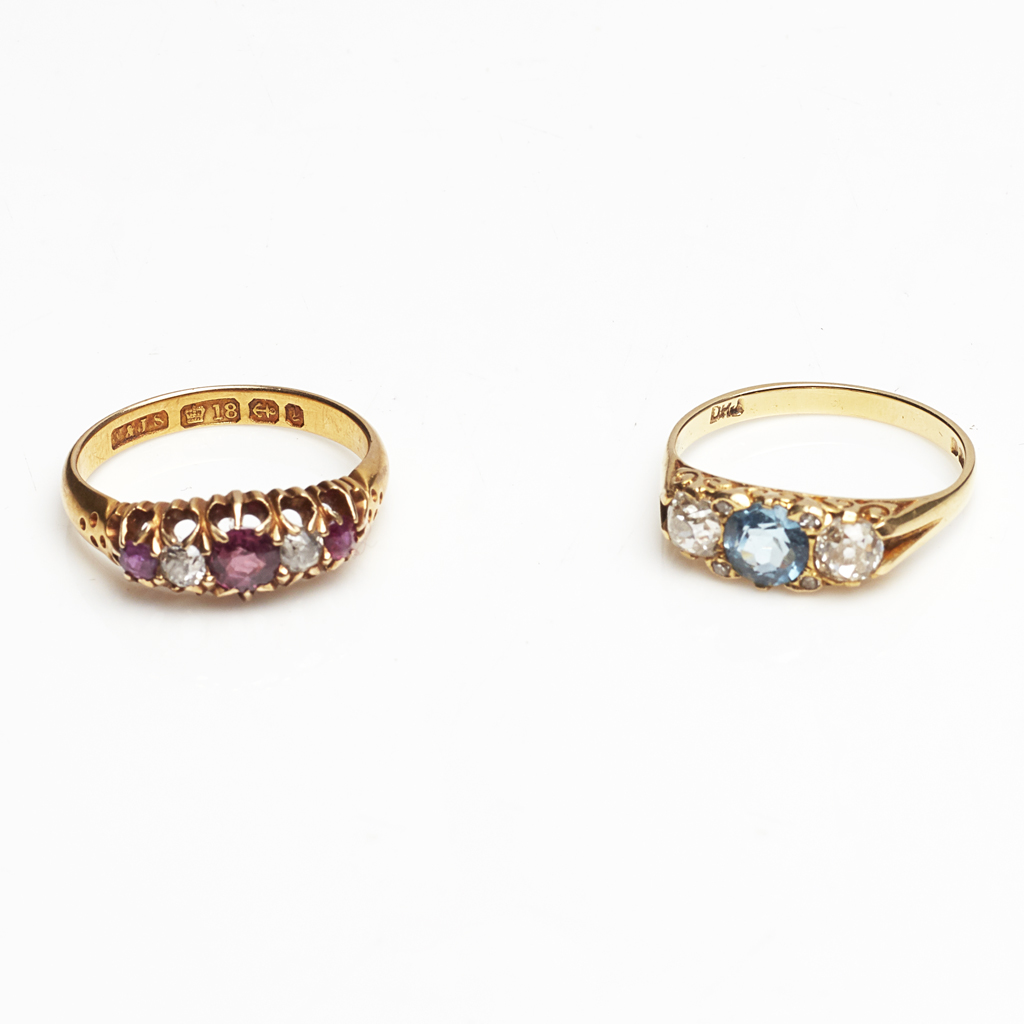 An 18ct aquamarine and diamond set ring