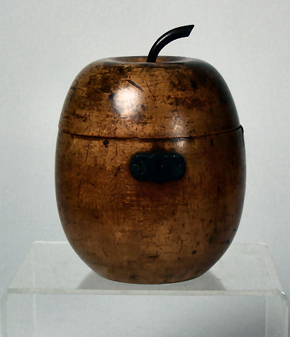 A 19th century fruitwood apple caddy