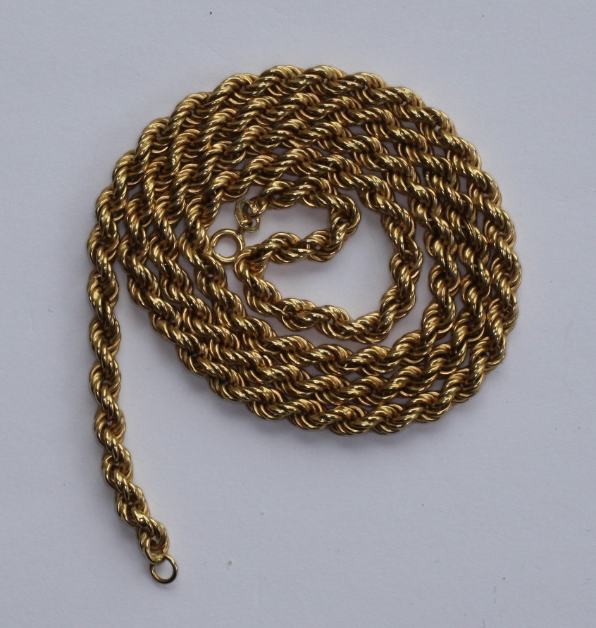 A yellow metal necklace