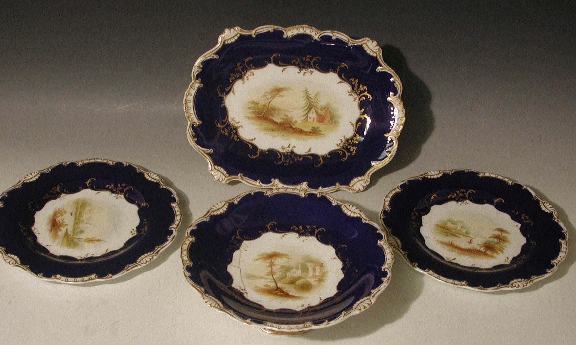 A Victorian blue and gilt part fruit service,