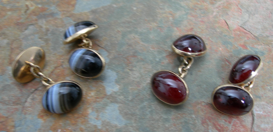 A pair of 9ct gold mounted cufflinks,