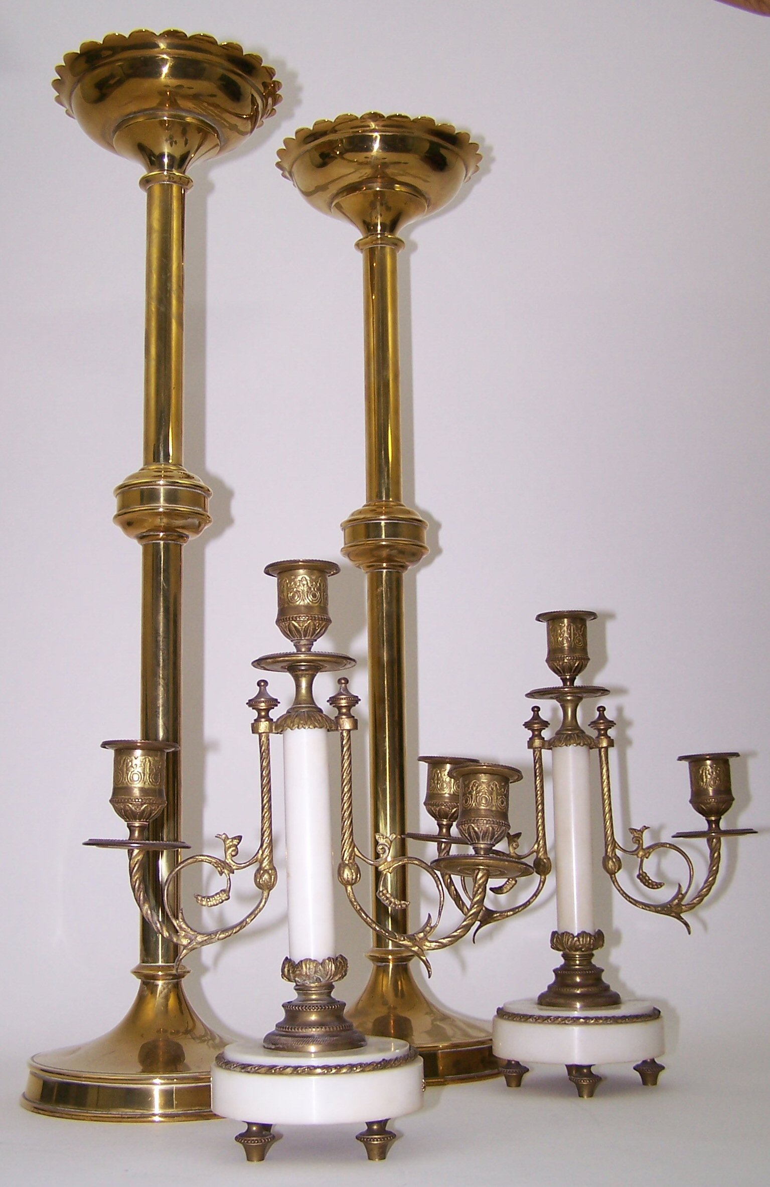 A pair of Gothic revival brass altar sticks,